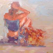 Woman Sitting On a Low Chair On a Beach